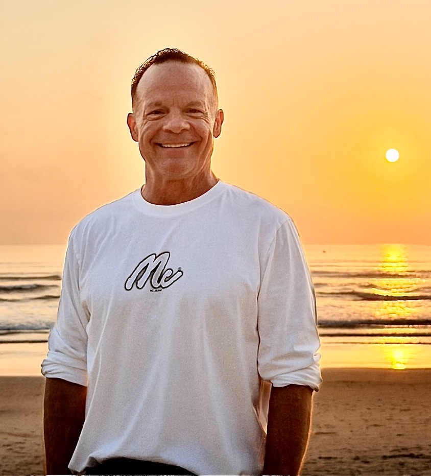 Mark 'Shep' Shepherd at sunset on the beach, 50 pounds lighter, April 2026